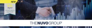 Business professionals shaking hands in front of financial graph overlays, symbolizing The Nuvo Group’s partnership with B2i Digital as a Featured Expert in compliance and financial services.