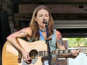 Frankie Raye performs October 5, 2024 at the Pensacola Beach Songwriters Festival