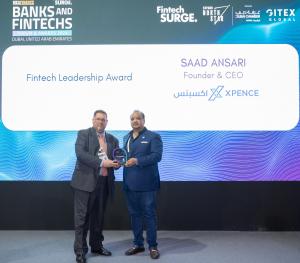  Here’s the caption for the second picture of you collecting your award:  Saad Ansari receiving the Fintech Leadership Award from Andrew Cover, Director at MEA Finance, at Fintech Surge 2024 in Dubai.