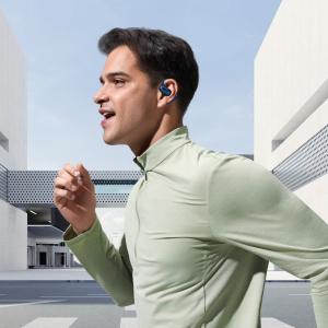 Man Wearing Soundcore AeroFit 2 Open Ear Earbuds