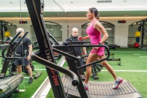 woman working out on treadmill 