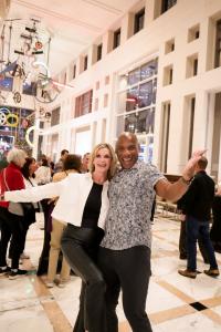 Mitchell Coles and Lee Ann Roughton laughing together at the social aspect of the Friends of Fourth Ward event at Arbol Eatery.