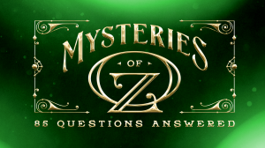 This is the Mysteries of Oz: 85 Questions Answered Logo that has gold text on an emerald background.