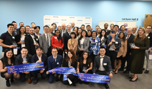 Group photo of the Top 40 Under 40 award winners at the Markham Board of Trade event, with honorees holding plaques and banners, celebrating their recognition for leadership and innovation.