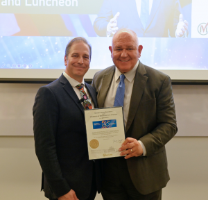 Chris Collucci, President & CEO of Markham Board of Trade, and Markham Mayor Frank Scarpitti stand together, smiling, symbolizing their commitment to supporting local business and community growth.