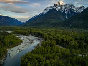 Canadian mountains and a river valley with dramatic lighting