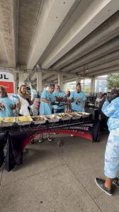 Mrs. Elite Texas Universe Serving Delicious Food to Houston's Homeless