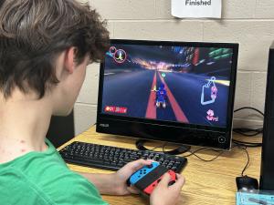 a student playing Mario kart 8