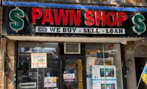 The front window/door of Bronx Pawn