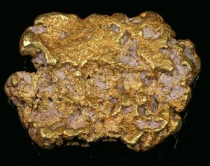 Placer gold & quartz nugget, found in Wright Creek, located 20 kilometers east of Atlin, British Columbia, Canada. 5.96 troy ounces. 90% Au. 2-1/2" by 1-3/4" x 1/2". (est. $17,000-$30,000).