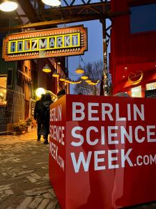 Engaging conversations and audience interaction at the Common Ground venue in Holzmarkt, Berlin Science Week 2024, featuring a lively mix of science, culture, and community exchange.