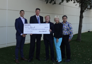 Arkearth Grubbs Dealerships with sustainability grant check to create pollination projects in north texas