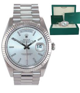 A silver Rolex watch