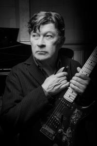 Robbie Robertson: Canadian-American musician, lead guitarist, and primary songwriter for the legendary rock group The Band.