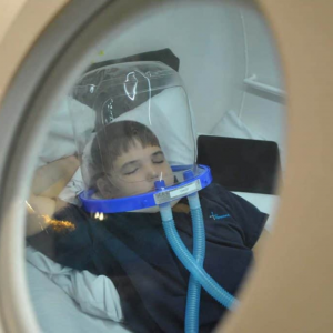 Child Treating With Hyperbaric Oxygen