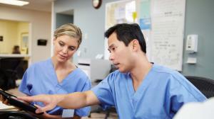 Nurses discussing patient