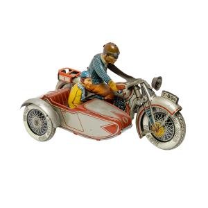 German 1930s lithographed tin T-694 toy motorcycle with sidecar, made by Tipp & Co., a great display piece with excellent gloss and color, tested and working (CA$2,950).