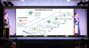 Davis Joseph during his SIPS 2024 Summit Plenary Presentation describing his major discovery that leads to the curing of Alzheimer's and Parkinson's diseases