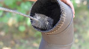 Chimney sweeping in-progress by Fresh Air Duct Cleaning