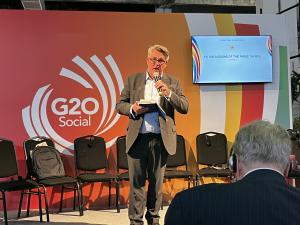 Kevin Hyland speaking for IF20 at the G20 Social