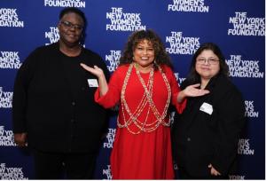 Neighborhood Dinner Honorees Wanda Salaman (Mothers on the Move) and Mariana Ortega (Cooperative Home Care Associates) with Mistress of Ceremonies Rhina Valentin (Photo Credit: Shutterstock / Jared Siskin)