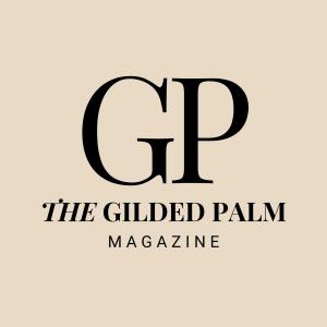 The logo for The Gilded Palm Magazine with black elegant text on a neutral background.