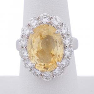 Yellow sapphire and diamond ring in platinum, with an oval cut yellow Ceylon sapphire weighing about 12.12 carats and 14 round cut diamonds weighing 2.38 total carats (est. $14,000-$16,000).