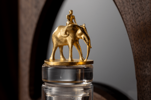 Crowned with a gilded “hood ornament” topper of Raj Peter Bhakta astride an elephant, this landmark release towers over its competitors