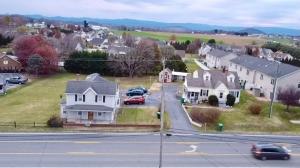  3 homes (2 are currently income producing) on .76 +/- acre parcel fronting Main Street, with 190' +/- of frontage on Main Street in Mt Crawford, VA