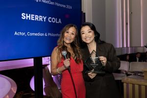 Actress and comedian Sherry Cola receives NextGen Award presented by Katie Chin at TeachAAPI's Giving Tuesday Gala in LA