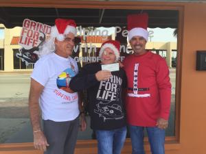 Heads of charities benefited by Surfing Santas of Cocoa Beach