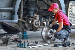 Diesel Mechanic Repairing Truck