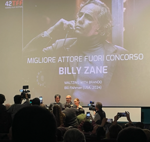 Billy Zane receiving the Best Performance Award at the 42nd Annual Torino Film Festival