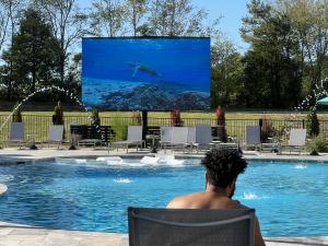 This 246 inch YOLO TV is the largest TV in the area and no other business has one for public use. The daylight bright weatherproof features make this a great choice, and featured amenity for multifamily apartment buildings