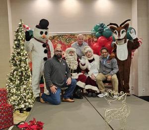 Dan Moyer, Executive Director of GLVADA with Santa and Friends at Children's Christmas Luncheon