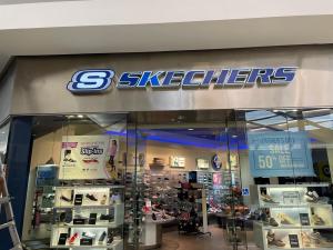 Elevate your storefront with the Skechers Lighted Sign from Royal Signs & Awnings. Expertly designed to capture attention, this vibrant and durable sign ensures your store stands out, even in low light. Crafted with high-quality materials, the illuminated