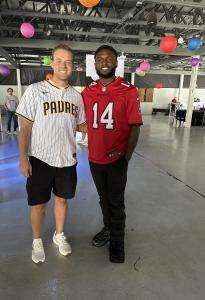 MLB Padres pitcher Michael King, founder of King of the Hill Foundation, and NFL wide receiver Chris Godwin of Tampa Bay Buccaneers, founder of Team Godwin Foundation, unite to support families in need at Yob Family Foundation’s 11th Annual Christmas Events.