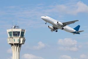 An airplane and control tower