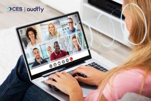 A laptop with Audfly’s Focusound Screen® technology, showcasing directional sound emitted from the screen, providing a focused and private audio experience.