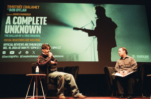 Timothée Chalamet discusses the film 'A Complete Unknown' with Country Music Hall of Fame VP Michael Gray. Photo by Ray Di Pietro.