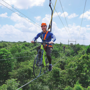 man in a sky bike trail at selvatica