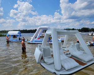 Floating Inflatable Party Canopy at the sandbar in the lake.