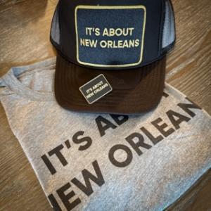 JAMNOLA will be donating 100% of proceeds from "It's About New Orleans" baseball caps, tees and pins thru March