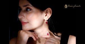 A girl  wearing beautiful  lab created ruby earrings and Pendants