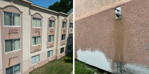 Exterior wall of the hotel with stain and stucco damage