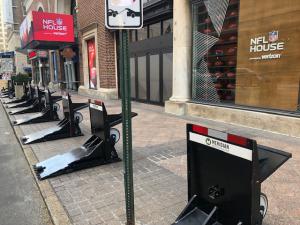Vehicle barriers in front of NFL House building