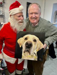 Clive giving Santa a present