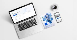 A clean, minimalistic workspace featuring a laptop displaying the Coursera page for the course 'Generative AI and Blockchain,' a printed course booklet, a smartphone showing a course video, and a cup of coffee on a white background.