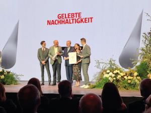 Josef and Julia Zotter accepting the Award in Graz, Austria