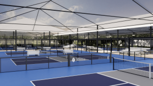 Pickleball court enclosed in PICKLEGLASS™